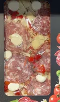 Wood fired pizza italian salami and spicy roquito pepper