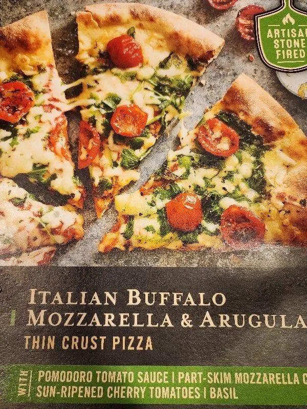 Italian buffalo mozzarella & arugula thin crust pizza