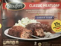 Large size ketchup-glazed meatloaf made with natural beef & pork in a homestyle gravy with russet mashed potatoes, meatloaf