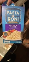 Angel hair pasta in a creamy butter and garlic sauce with other natural flavors
