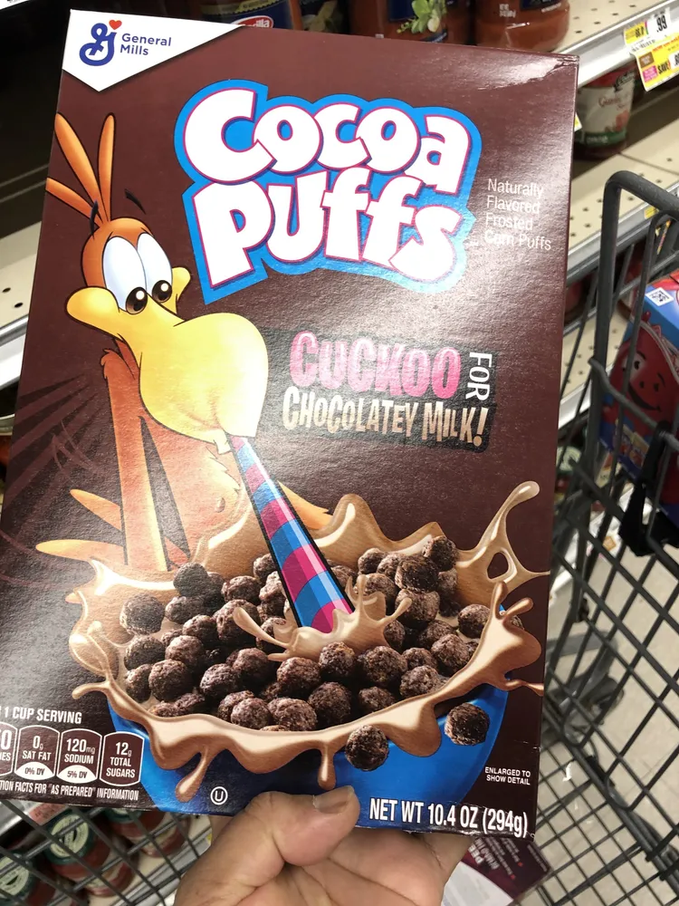 Cocoa puffs chocolatey milk frosted corn puffs