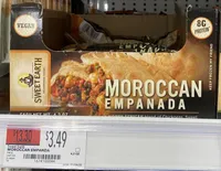 Moroccan a north african blend of chickpeas, sweet potatoes & bell peppers in a spicy harissa sauce empanada, moroccan