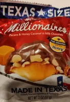 Pangburn's of texas, millionaires, pecans & honey caramel in premium milk chocolate