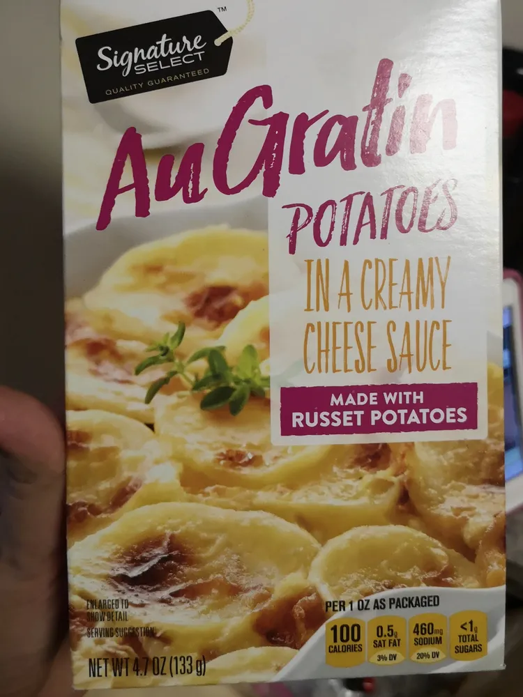 Signature select au gratin potatoes in a creamy cheese sauce