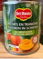perziken in schijven op lichte siroop