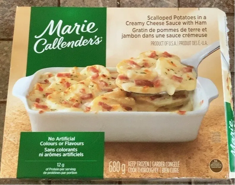 Gratin de pommes de terre et jambon dans une sauce cremeuse