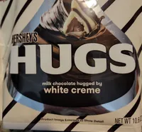 Hugs milk chocolate hugged by white creme