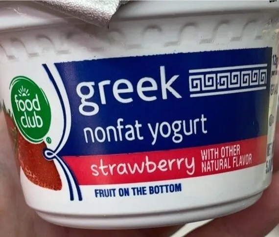 Strawberry fruit on the bottom greek nonfat yogurt