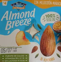 Postre de almendras, melocotón - maracuya