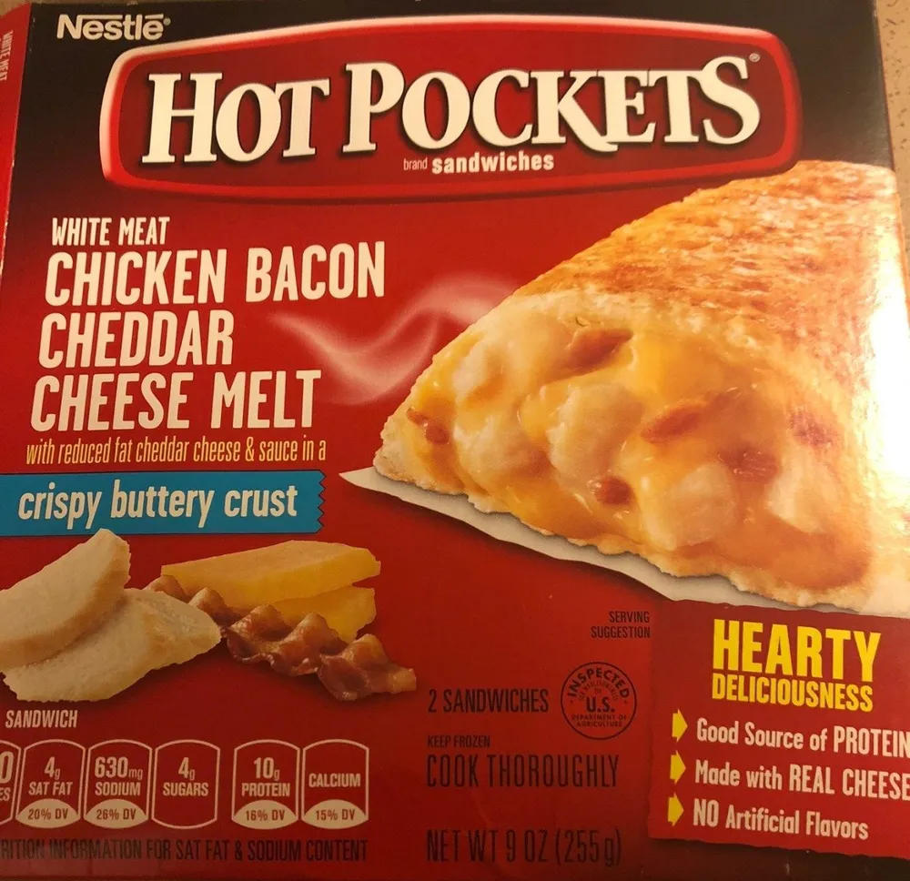 White meat chicken bacon cheddar cheese melt with reduced fat cheddar cheese & sauce in a crispy buttery crust sandwiches, white meat chicken bacon cheddar cheese melt