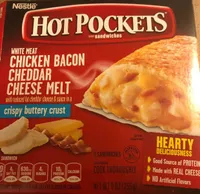White meat chicken bacon cheddar cheese melt with reduced fat cheddar cheese & sauce in a crispy buttery crust sandwiches, white meat chicken bacon cheddar cheese melt
