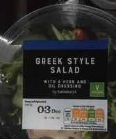Greek style salad with herb and oil dressing
