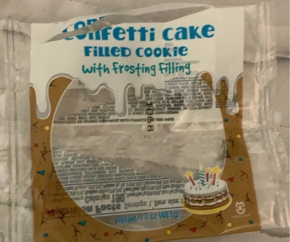 confetti cake filled cookie with frosting filling