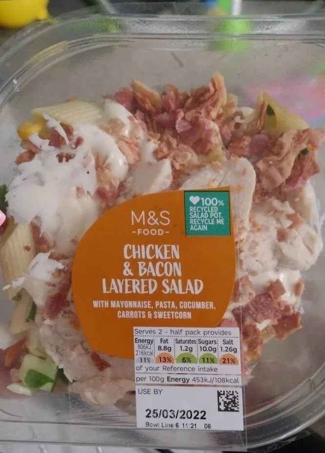 chicken and bacon layered salad with mayonnaise, pasta