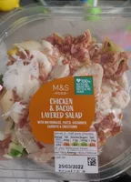 chicken and bacon layered salad with mayonnaise, pasta