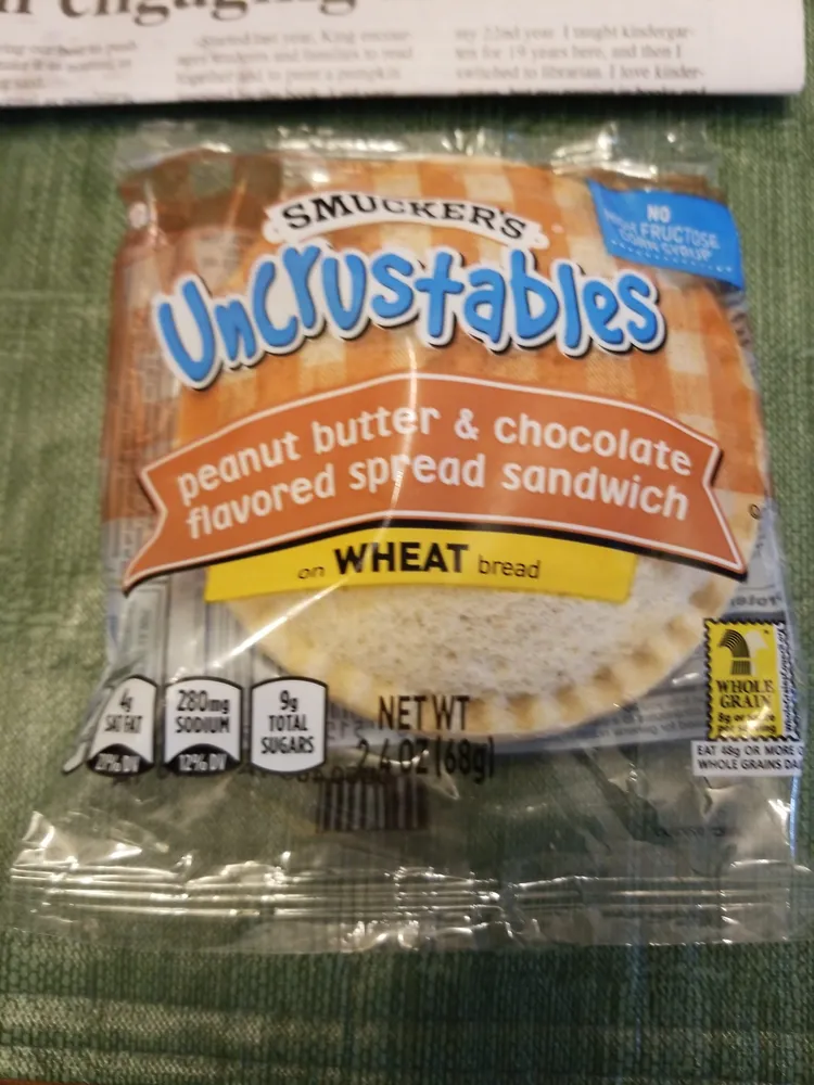 Uncrustables peanut butter & chocolate flavored spread sandwich
