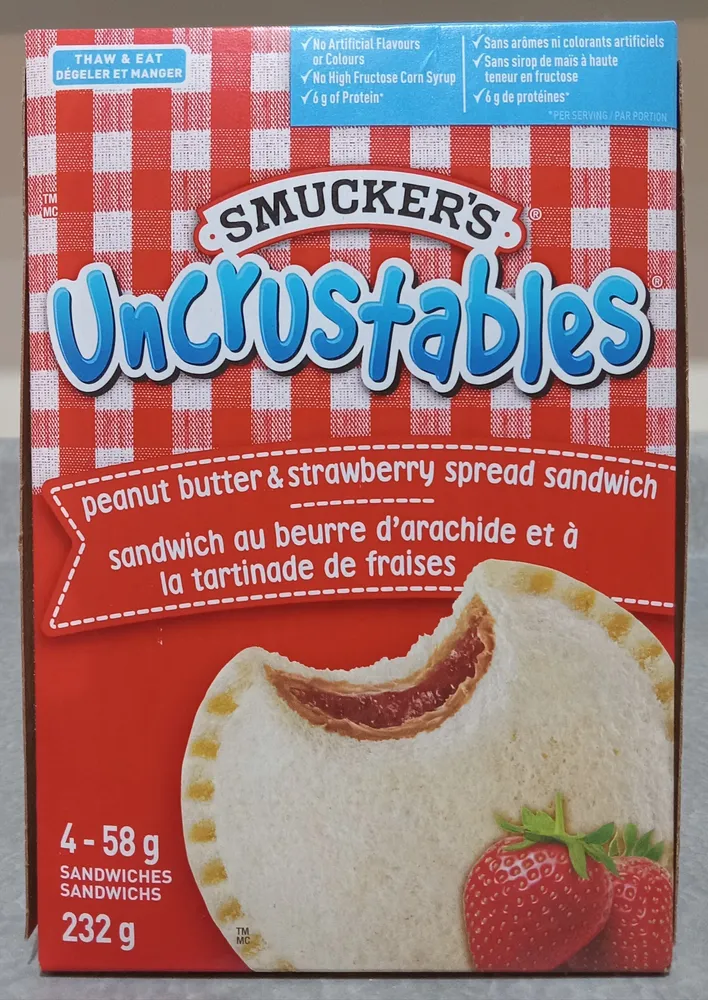 Peanut butter & strawberry spread sandwich