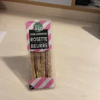 Sandwich au pain de mie complet garni de rosette de Lyon et de beurre