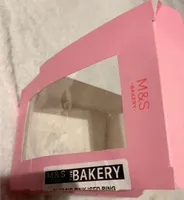 Classic pink iced ring donut