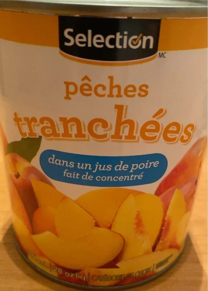 Pêches tranchées dans jus de poire