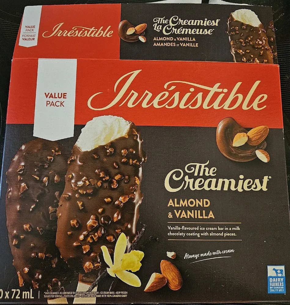 Vanilla-flavoured Ice Cream Bar In Milk Chocolaty Coating With Almond Pieces