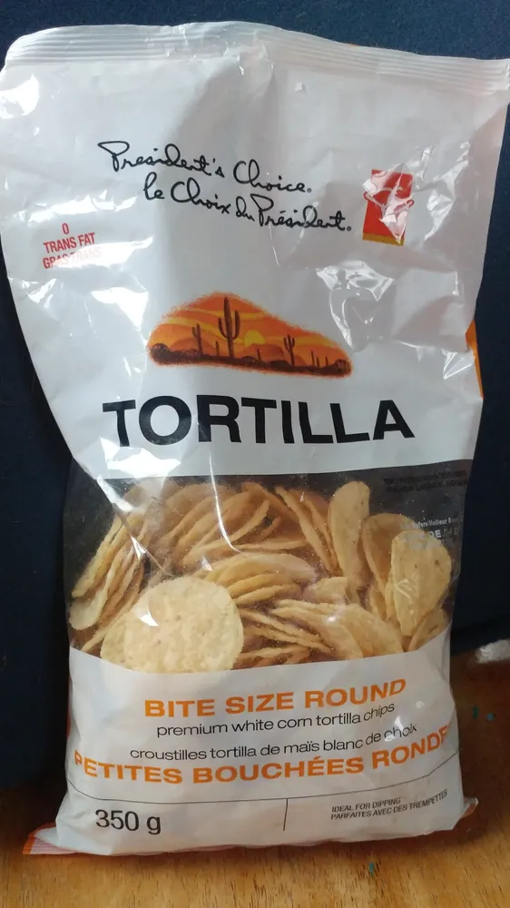 Tortilla bite size round premium white corn tortilla chips