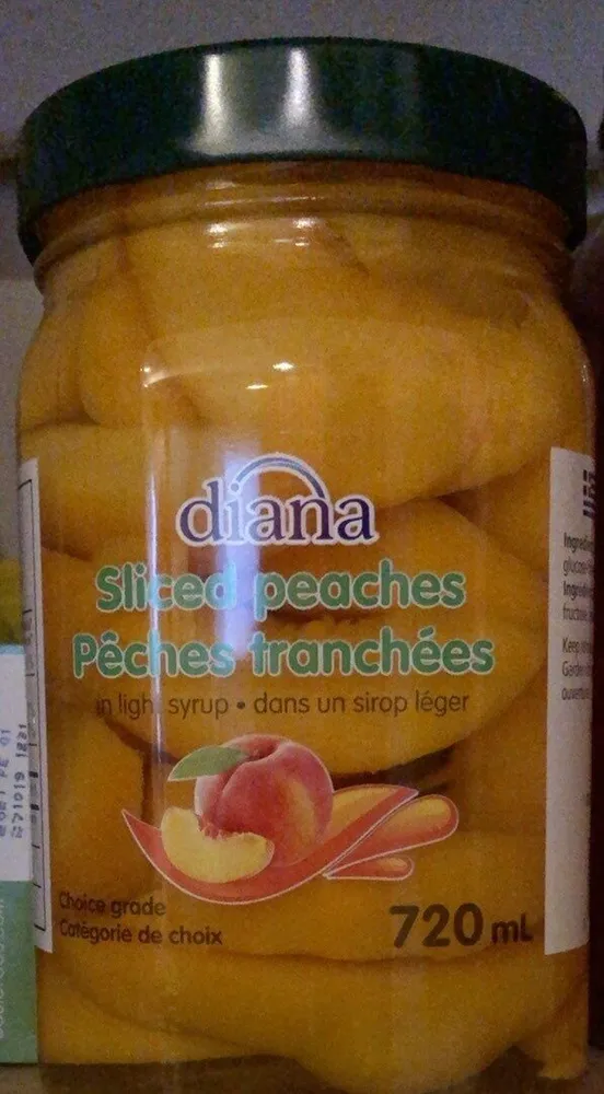 Pêches tranchées dans un sirop leger