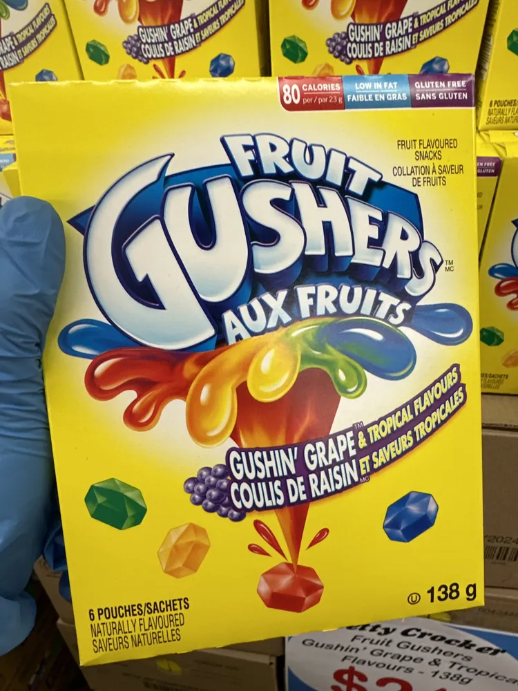 Fruit Gushers Gushin' Grape & Tropical Flavours / Aux fruits coulis de raisin et saveurs tropicales