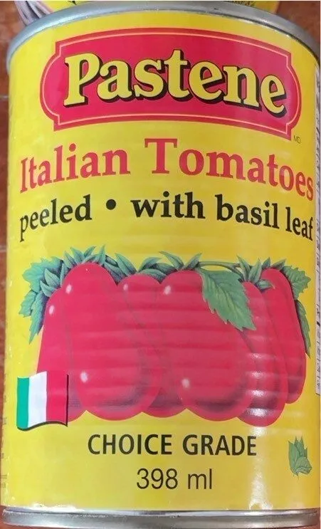Italian tomatoes peeled with basil leaf