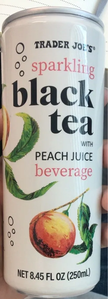 sparkling black tea with peach juice beverage
