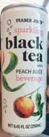 sparkling black tea with peach juice beverage