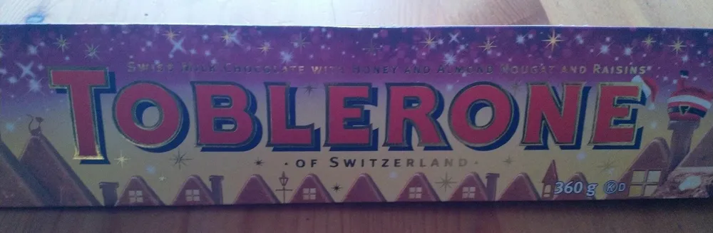 Swiss milk chocolate with honey and almond nougat and raisins