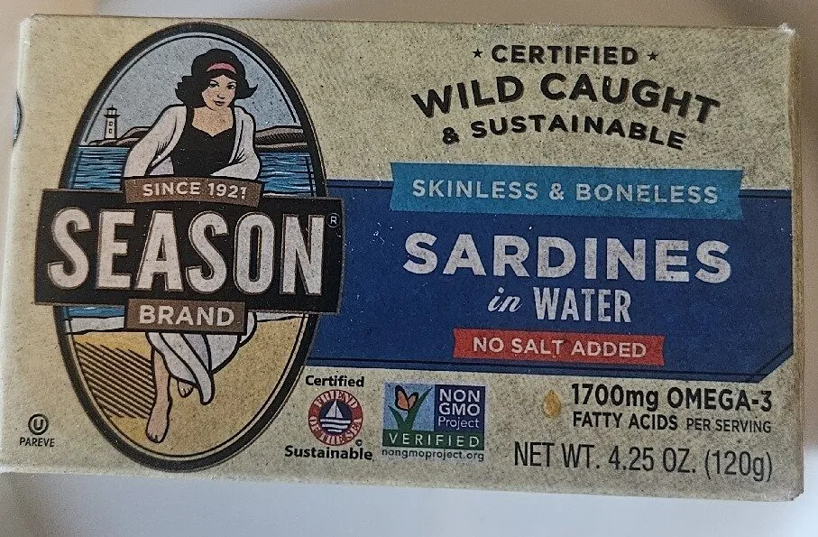 Season skinless and boneless sardines in water