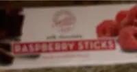 RASPBERRY FLAVORED STICKS covered in rich, milk chocolate