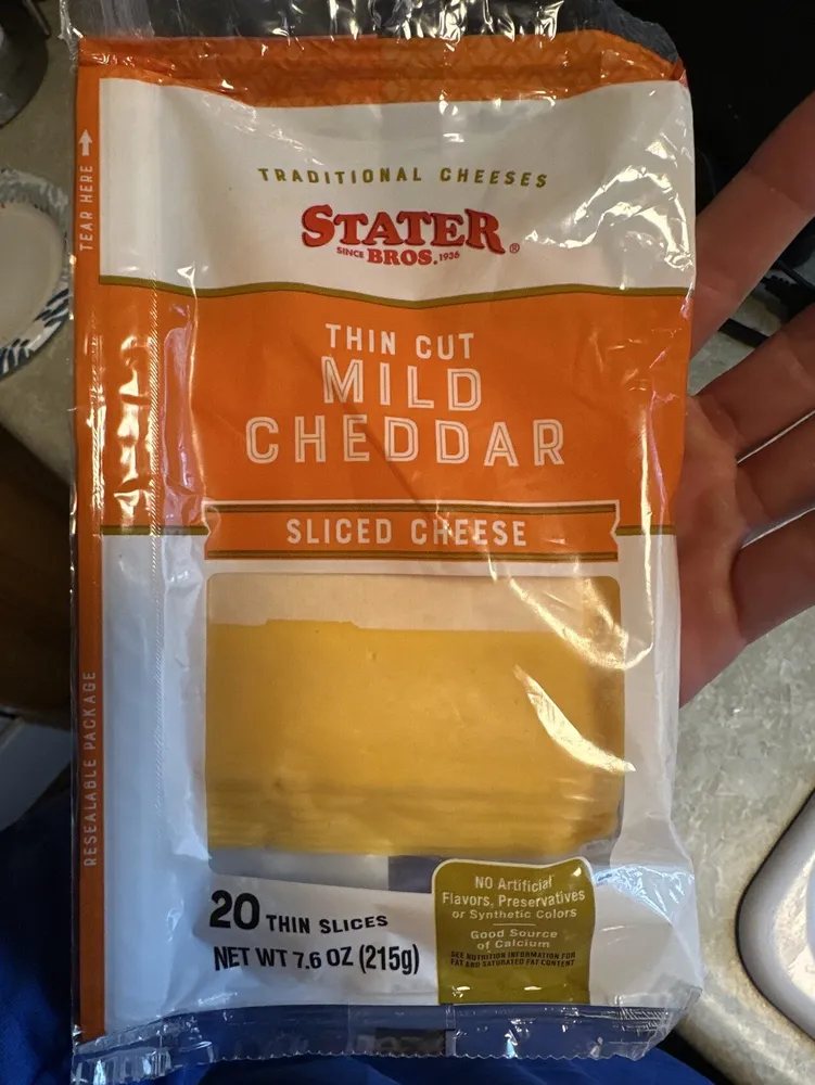 Deli style thin sliced mild cheddar cheese, mild cheddar