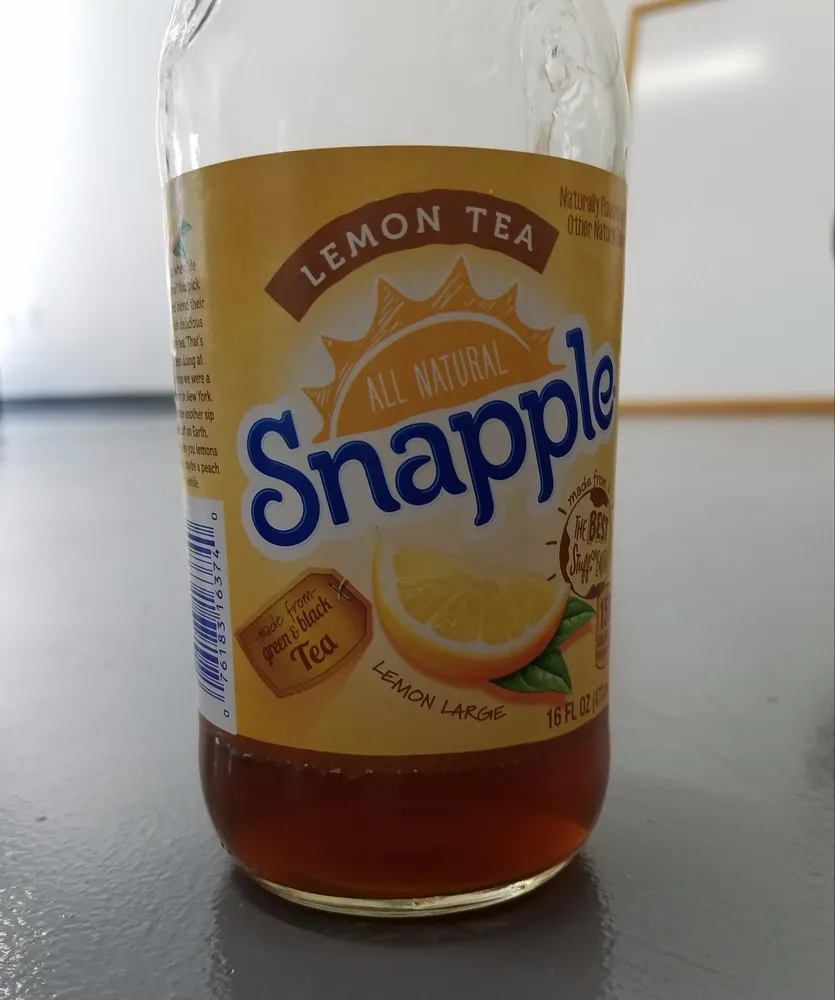 Snapple, lemon tea, made from green & black tea leaves
