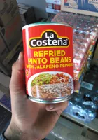 Refried pinto beans with jalapeno peppers