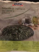 Salteado de espinacas con pasas y piñones