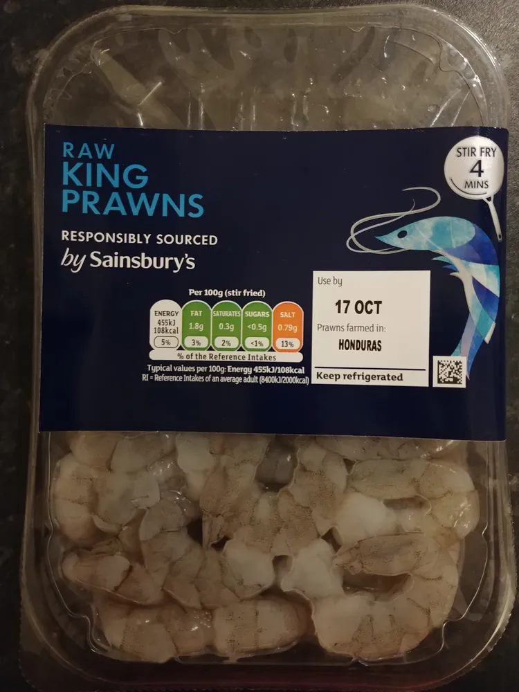 Raw peeled king prawns