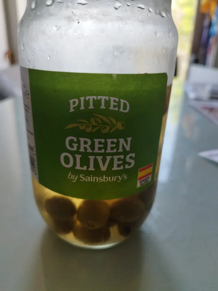 green pitted olives in brine