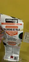 Salchicha De Pollo Con Queso Parmesano Y Pimienta Negra Partida