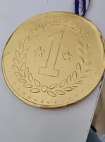 Medalla de chocolate con leche