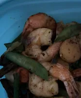 Citrus shrimp with spring veggie sauté