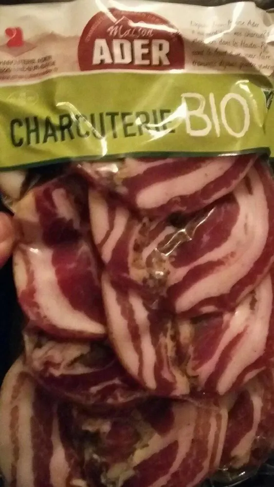 Poitrine roulée de porc tranchée