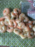 Queues de crevettes decortiquees cuites aux herbes