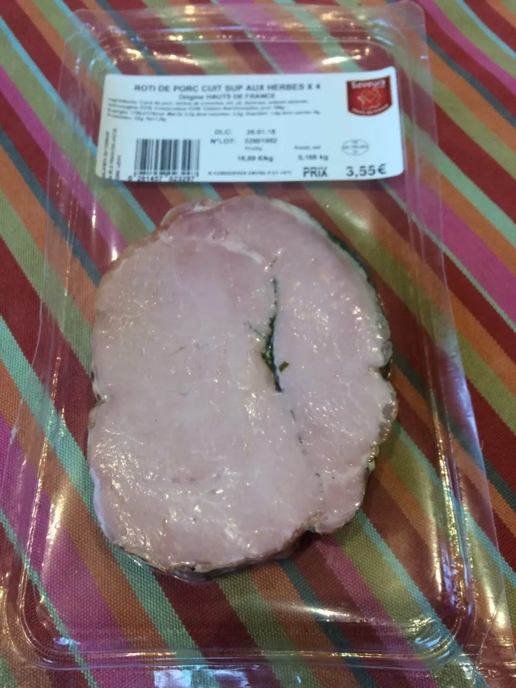 Rôti de porc cuit supérieur aux herbes