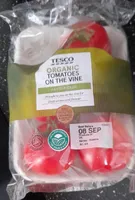 ORGANIC TOMATOES ON THE VINE