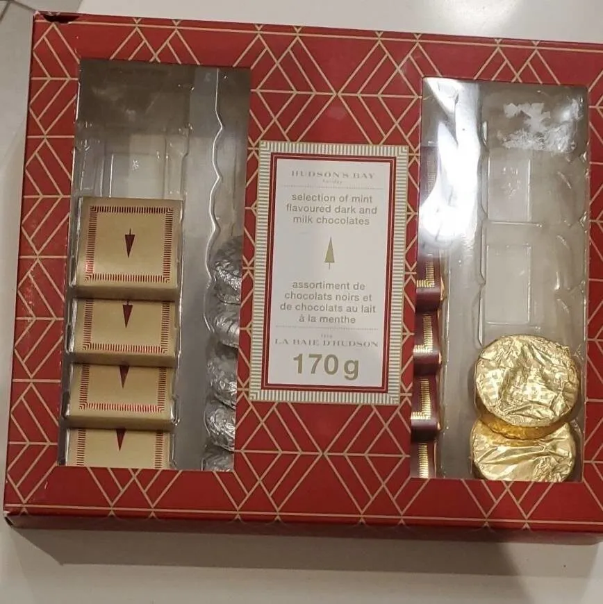 Sélection of m'intéresse flavoured dark and Milk chocolates