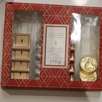 Sélection of m'intéresse flavoured dark and Milk chocolates