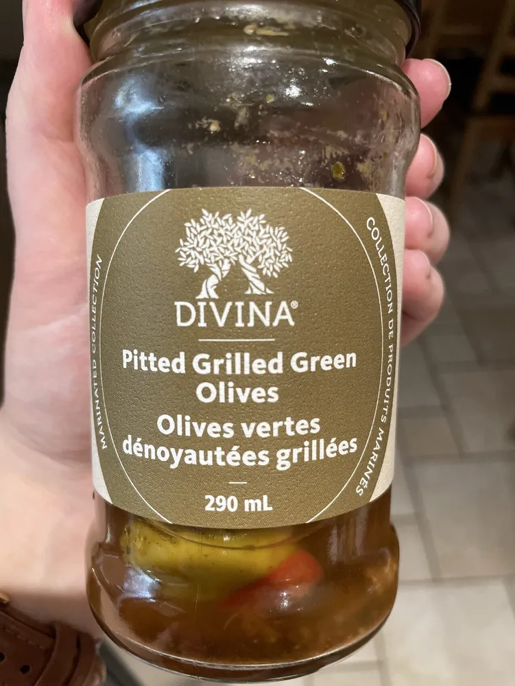 Pitted grilled green olives